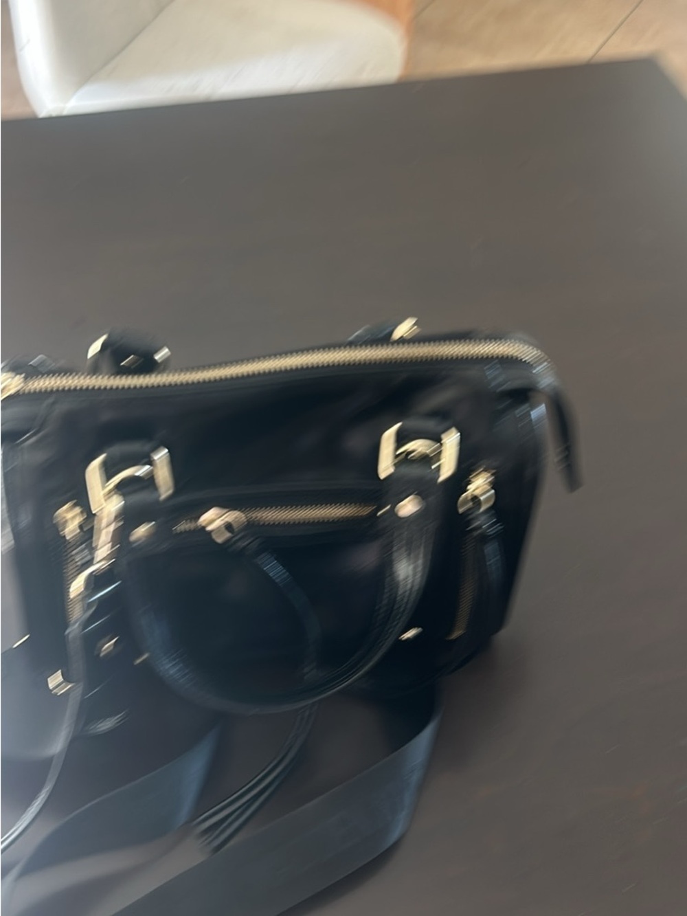 Classic Black Leather Crossbody Bag with Gold Hardware
